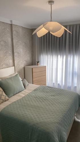 Una cama o camas en una habitación de Silgar 22
