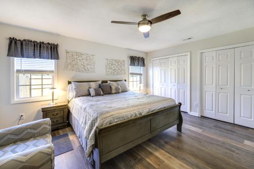 a bedroom with a bed and a ceiling fan at Updated Hubert Vacation Rental 5 Mi to Beaches! in Swansboro