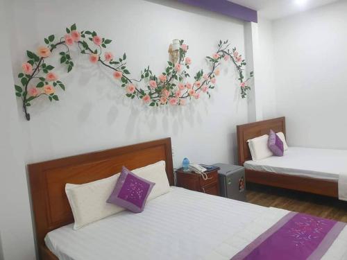 Postel nebo postele na pokoji v ubytování LẠI NGUYỄN BOUTIQUE HOTEL