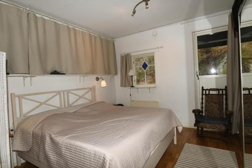 מיטה או מיטות בחדר ב-Nice independent holiday apartment on Saro