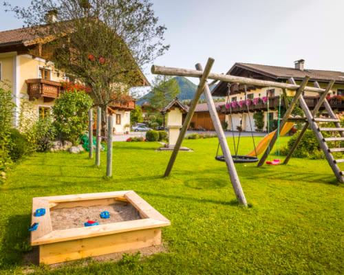 a park with a swing set and a playground at Unterwöhrlehen in Faistenau