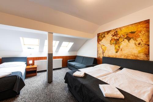 Postel nebo postele na pokoji v ubytování Hotel Zlatá Váha