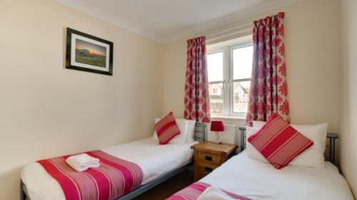 Postel nebo postele na pokoji v ubytování Malt Cottage