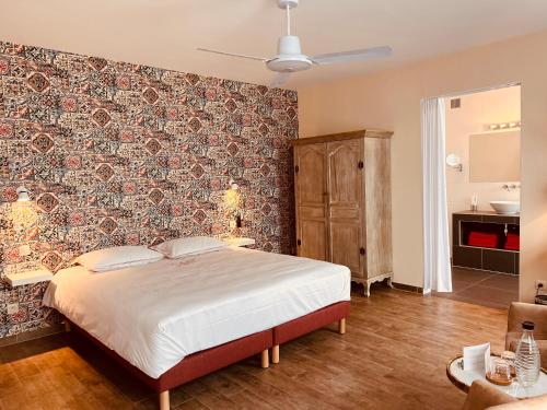 Postel nebo postele na pokoji v ubytování Hotel Het Heilig Genot