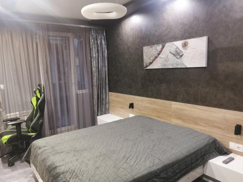 Ein Bett oder Betten in einem Zimmer der Unterkunft Апартамент Светли