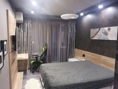 Ein Bett oder Betten in einem Zimmer der Unterkunft Апартамент Светли