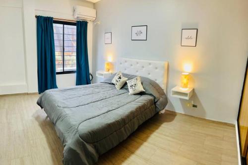 Posteľ alebo postele v izbe v ubytovaní excepcional depa en CABA 2 habitaciones con terraza y parrilla