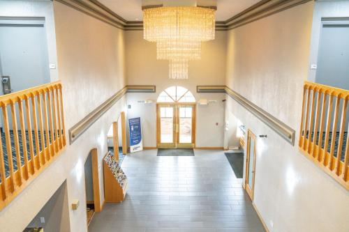 a hallway of a building with a chandelier at Quality Inn Seymour I-65 in Seymour