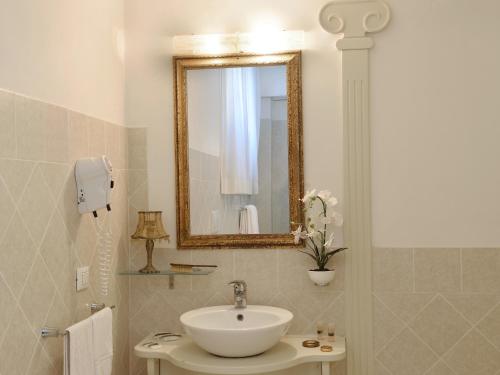 Koupelna v ubytování Hotel Corte dei Greci