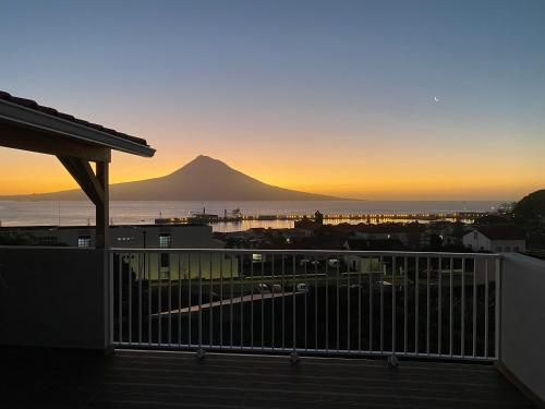 a view of a mountain from the balcony of a house at Retiro das Bananeiras in Horta
