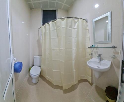 Koupelna v ubytování Hotel Genatsvale