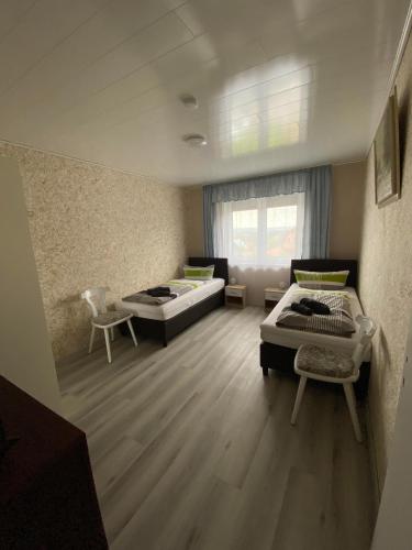 Кровать или кровати в номере Apartments Feniks