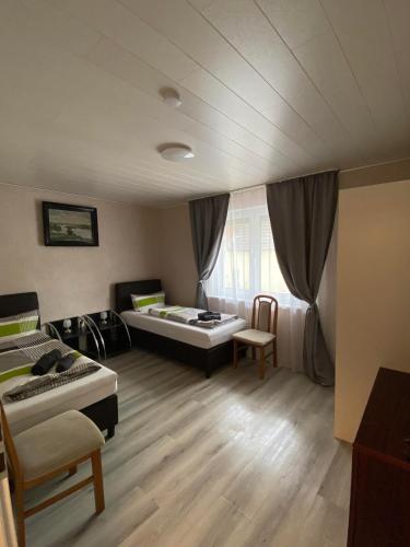 Кровать или кровати в номере Apartments Feniks