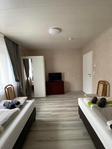 Телевизор и/или развлекательный центр в Apartments Feniks