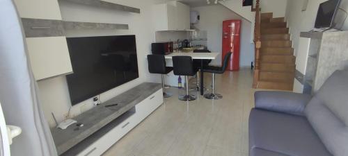 Een TV en/of entertainmentcenter bij Residence Vista Golf
