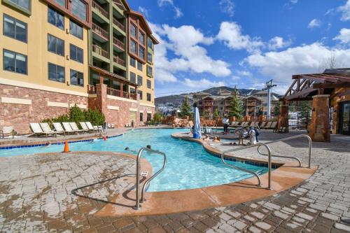 a swimming pool in a building with a resort at Grand Summit Lodge by Park City - Canyons Village in Park City