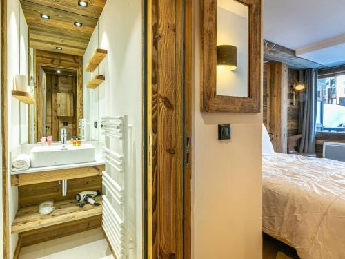 Appartement de prestige au pied des pistes avec wifi, parking couvert, et balcon exposé Est