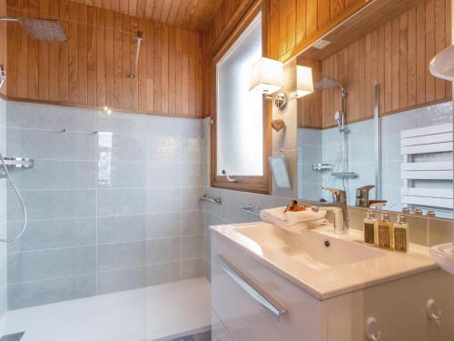 a bathroom with a sink and a shower and a tub at Appartement Val-d'Isère, 3 pièces, 6 personnes - FR-1-694-309 in Val-d'Isère