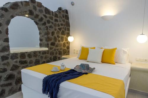 Ένα ή περισσότερα κρεβάτια σε δωμάτιο στο Asma Suites