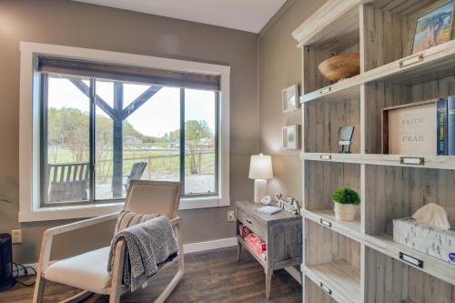 a home office with a desk and a window at Waterfront Home Near Mark Twain National Forest in Poplar Bluff