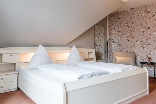 Postel nebo postele na pokoji v ubytování Straendhus Bed&Breakfast