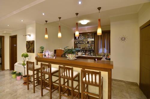 Kuchyň nebo kuchyňský kout v ubytování Filoxenia Hotel