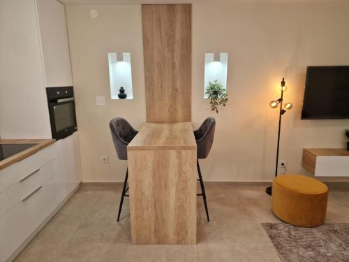 Dapur atau dapur kecil di Studio Apartment Mare with private garden and jacuzzi