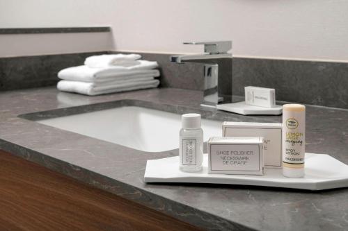 a bathroom counter with a sink with products on it at Fairfield Inn & Suites by Marriott Denver Tech Center North in Denver