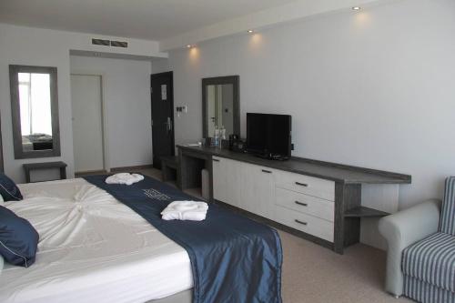 Postel nebo postele na pokoji v ubytování Moonlight Hotel - All Inclusive
