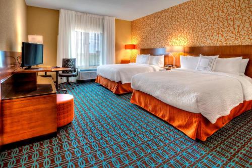 Кровать или кровати в номере Fairfield Inn and Suites Oklahoma City Yukon