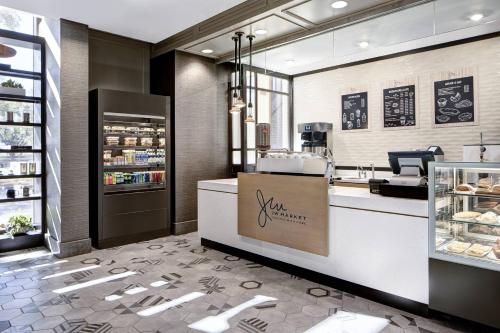 a bakery with a counter in a store at JW Marriott Houston by the Galleria in Houston