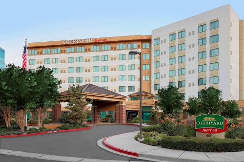 a rendering of the front of a hotel at Courtyard by Marriott San Jose Campbell in Campbell