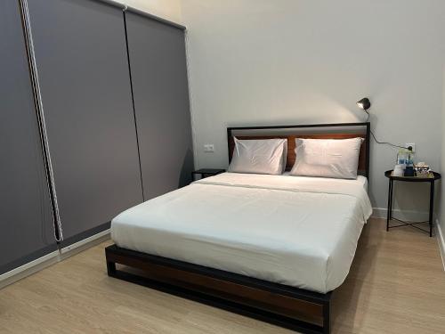 Postel nebo postele na pokoji v ubytování Cendhani Raras Gallery