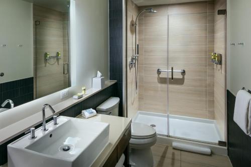 a bathroom with a sink and a toilet and a shower at Element Las Vegas Summerlin in Las Vegas