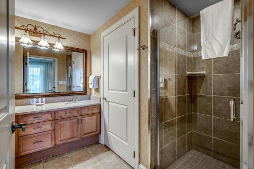 a bathroom with a shower and a sink and a toilet at Huge Luxury 2/2 AAA Four Diamond Resort by Luxury Beach Rentals in Myrtle Beach