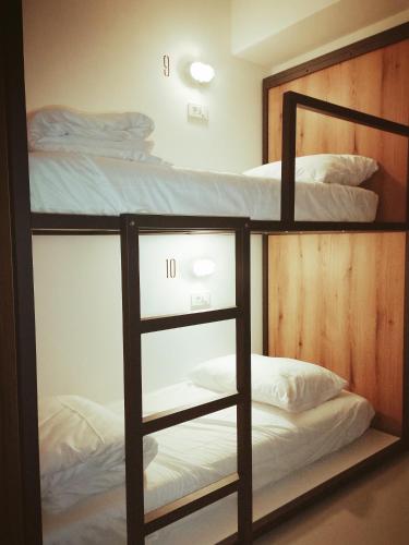 Cama o camas de una habitación en GARAGE HOSTEL