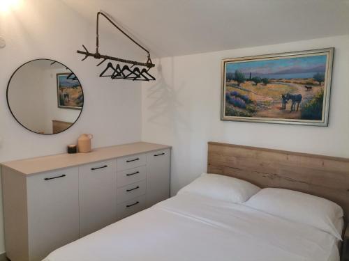 Posteľ alebo postele v izbe v ubytovaní Holiday Batarelo