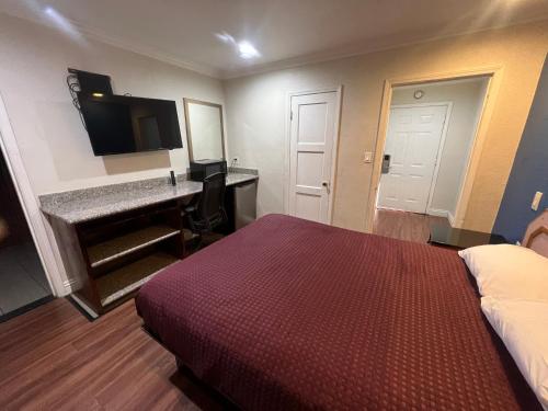 Postel nebo postele na pokoji v ubytování Harris Motel