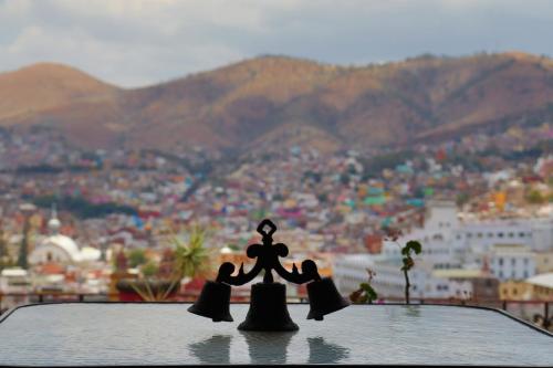 a group of people sitting on top of a table at Hotel Chocolate Suites in Guanajuato