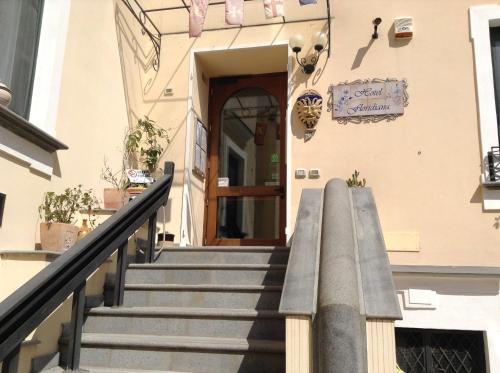 a staircase leading to a door of a building at Hotel Floridiana in Amalfi