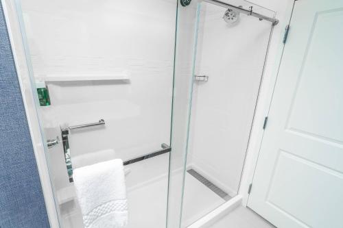 a shower with a glass door in a bathroom at Residence Inn by Marriott Reno Sparks in Sparks