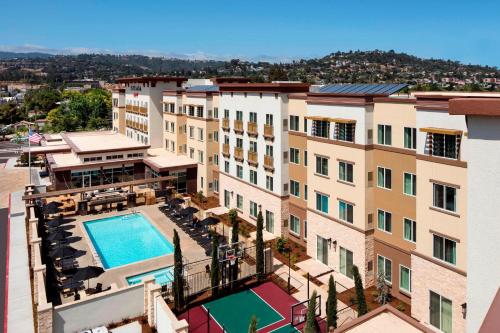 an aerial view of a hotel with a swimming pool at Residence Inn by Marriott Redwood City San Carlos in San Carlos