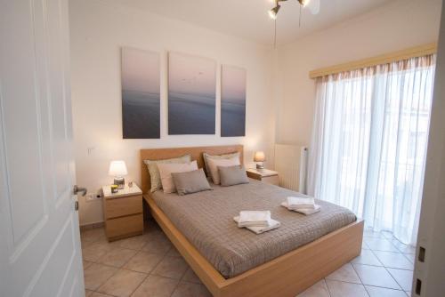 Postel nebo postele na pokoji v ubytování Apartment with view in Kiveri, near Nafplio
