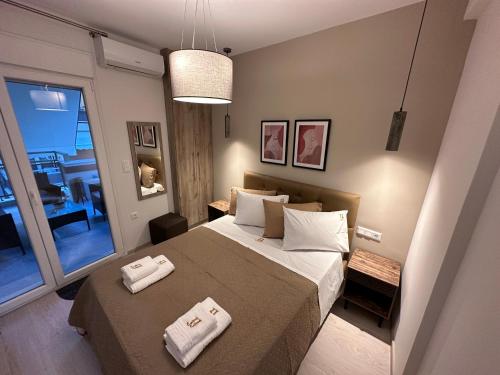 Voodi või voodid majutusasutuse jj volos luxury center home toas