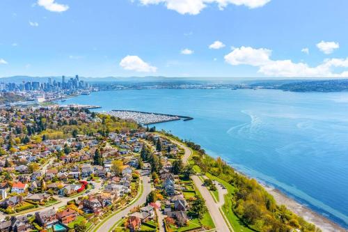 an aerial view of a park next to the water at Magnolia on the Hill in Seattle