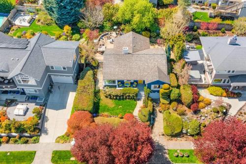 an aerial view of a house with a yard at Magnolia on the Hill in Seattle
