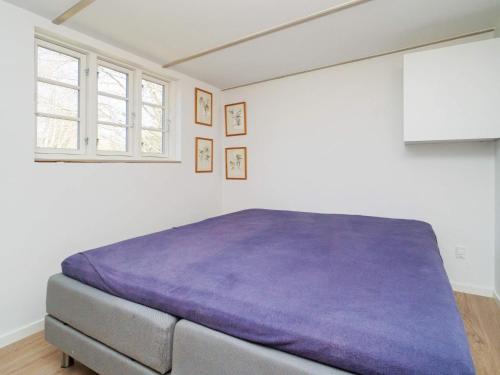 Postel nebo postele na pokoji v ubytování Three-Bedroom Holiday home in Kalundborg 3