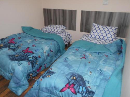 A bed or beds in a room at Anas House2