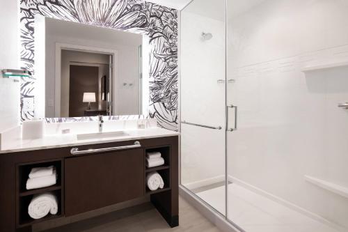 a bathroom with a sink and a shower at Residence Inn Los Angeles Glendale in Glendale