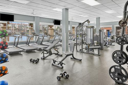 a gym with a lot of treadmills and machines at Marriott's Grande Vista in Orlando